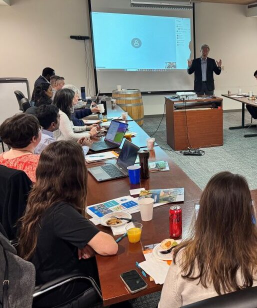 Trainees attending a presentation by Dr. Honwei Xin. 